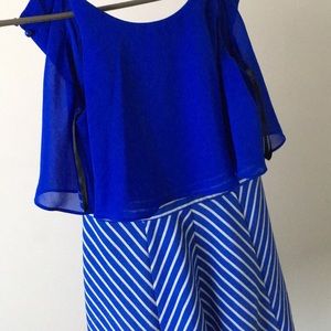 A white and blue dress soft and cute for kids